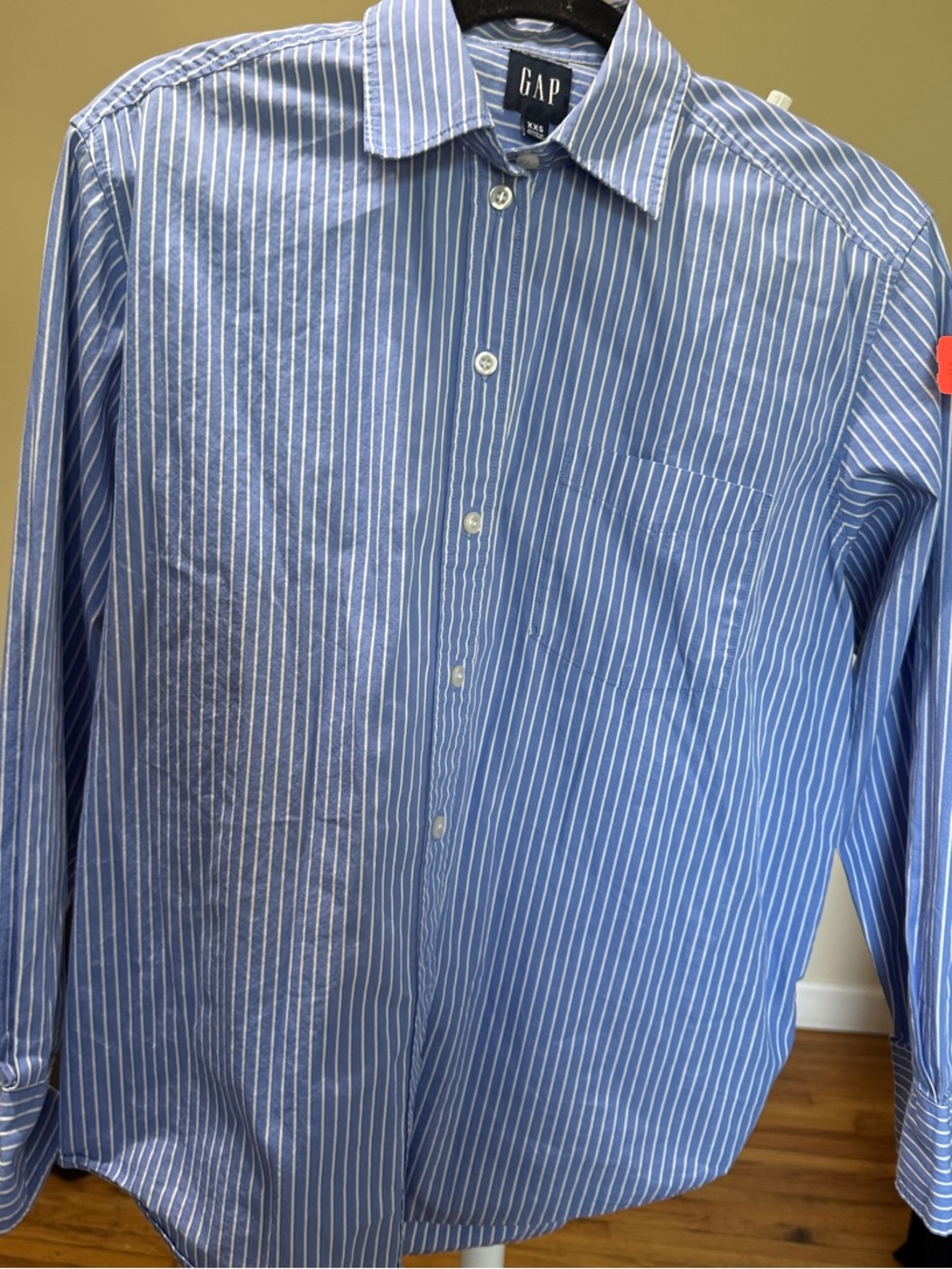 GAP Blue and White Vertical-Stripe Dress Shirt

Please note this shirt is xxs